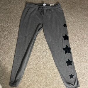 New with tags. Gray Star-Patterned women's  Joggers. Size m